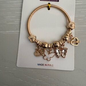 Gold butterfly, and heart charm bracelet